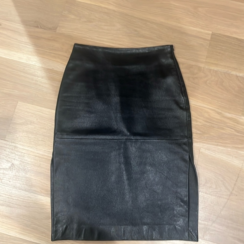 BCBG. Max azaria. Genuine leather skirt. Side slits. Size 0.